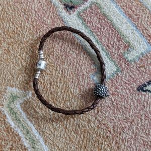 Pandora leather cord bracelet with hedgehog charm